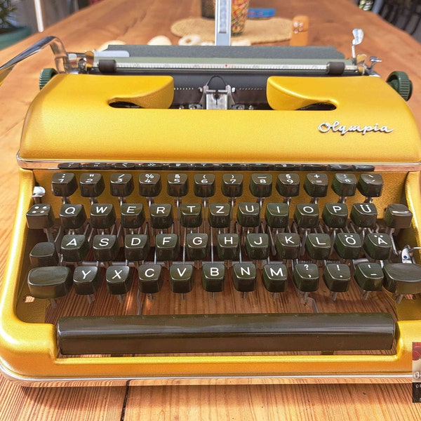 vintage Schreibmaschine OLYMPIA SM 3 special edition gold (tw94), 1959, im Koffer, mit Farbband, voll funktionstüchtig!