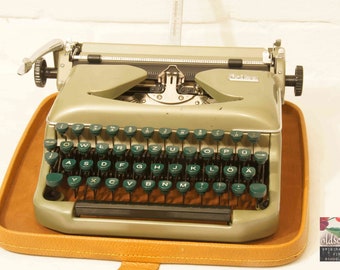 vintage typewriter  ERIKA mod. 11  green (tw30), 1957, with original case, no longer functional! Decoration!