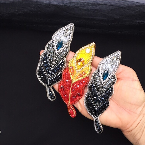 Feather brooch pin best sale