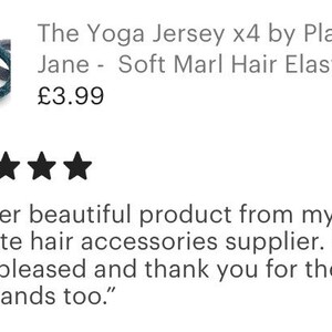 May include: Four brown and gray hair ties with the text "Plain Jane" on one of the ties. The text "The Yoga Jersey x4 by Plain Jane - Soft Marl Hair Elastics" and "&pound;3.99" are also visible. The image has a five-star rating and a customer review that reads "Another beautiful product from my favourite hair accessories supplier. Really am so pleased and thank you for the little extra bands too."
