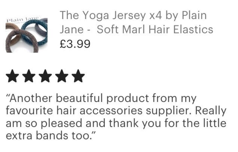 May include: Four brown and gray hair ties with the text "Plain Jane" on one of the ties. The text "The Yoga Jersey x4 by Plain Jane - Soft Marl Hair Elastics" and "&pound;3.99" are also visible. The image has a five-star rating and a customer review that reads "Another beautiful product from my favourite hair accessories supplier. Really am so pleased and thank you for the little extra bands too."