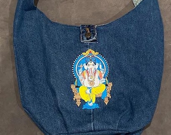 Embroidered Ganesha Crossbody Bag made from recycled jeans and lined with repurposed fabric. Two pockets inside, one zippered.