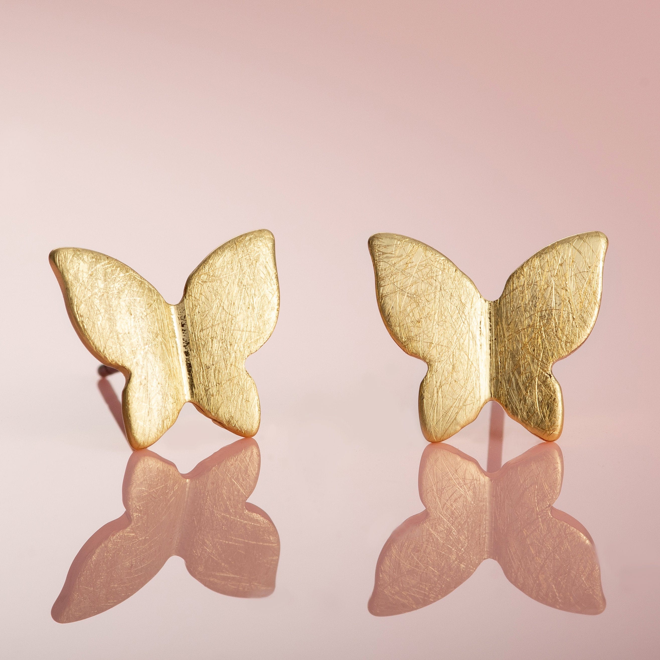 Butterfly design gold on sale earrings