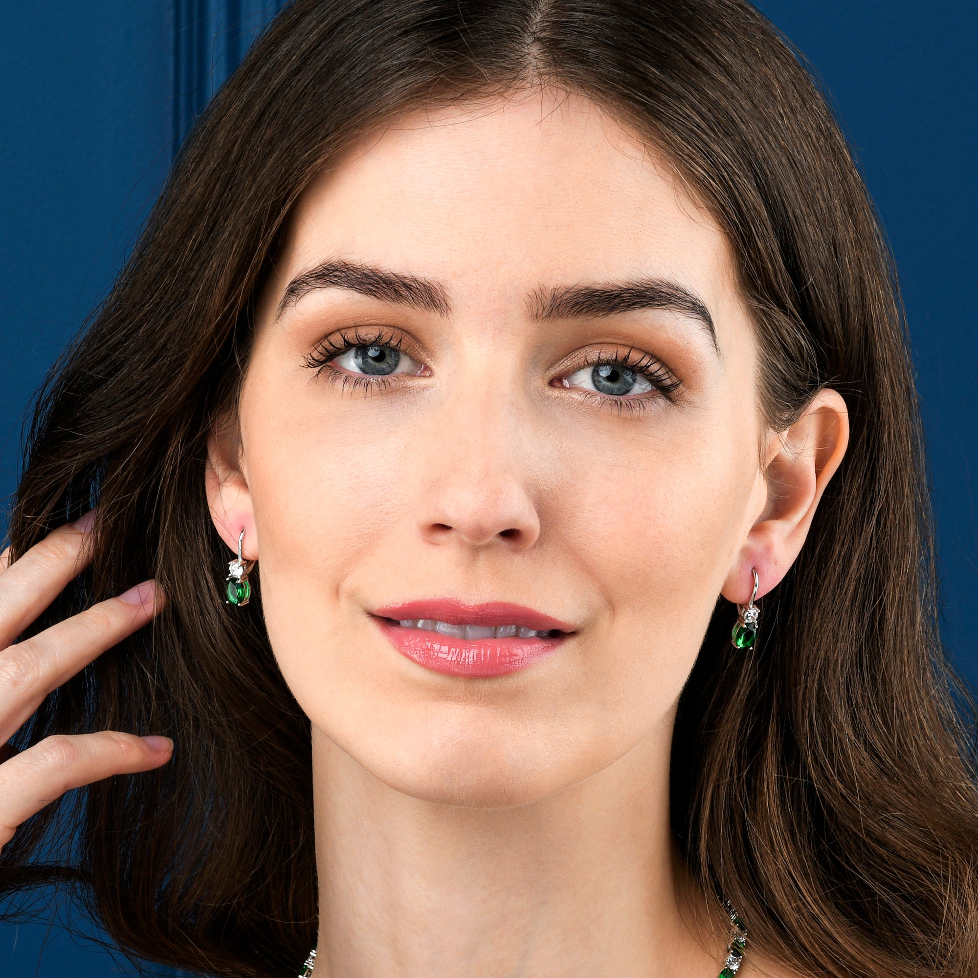 Koop Zilveren oorringen oorbellen model pomellato groene steen van de