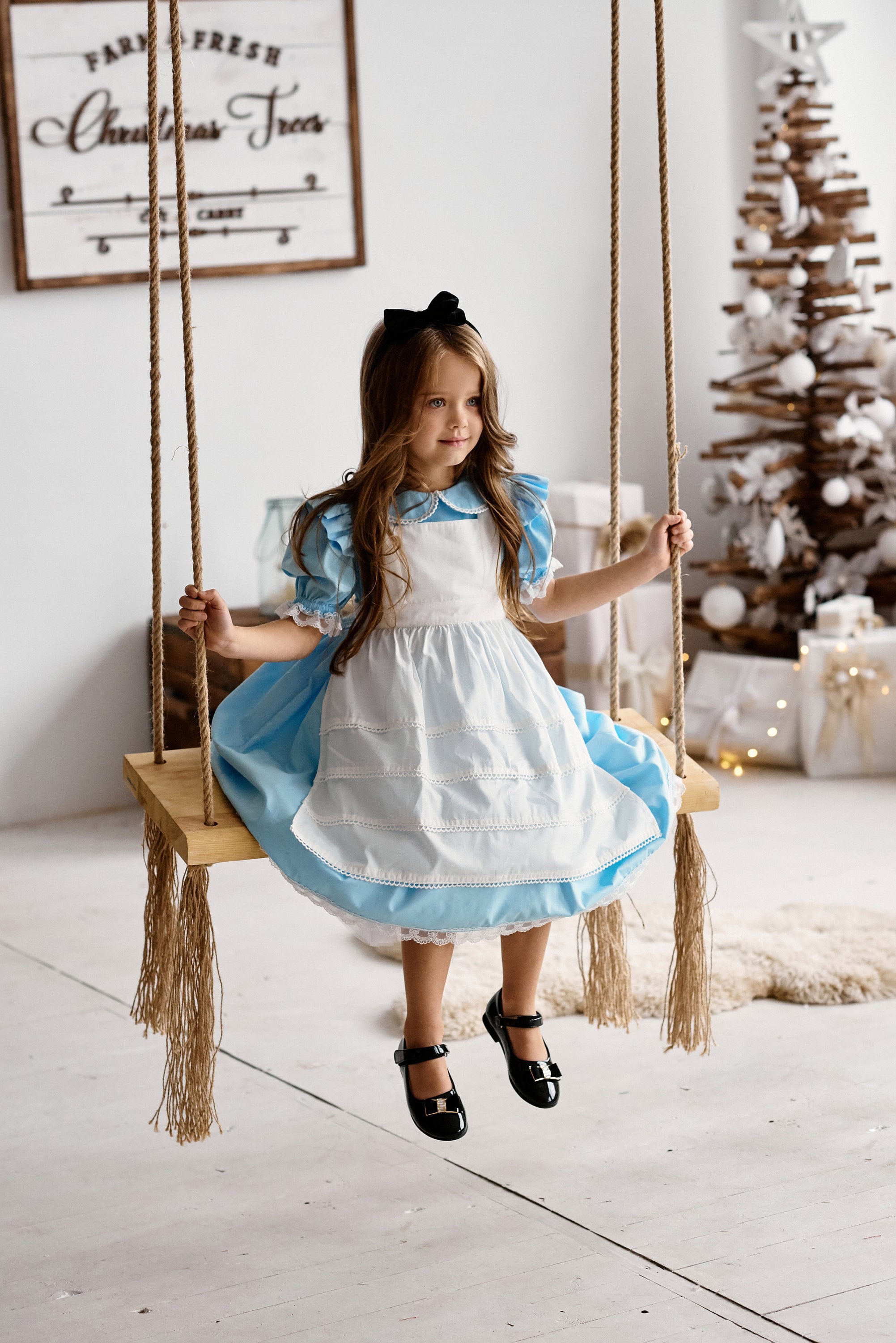 Custom Alice in Wonderland Dress with Pinafore in Baby or Toddler Sizes.  $70.00, via .
