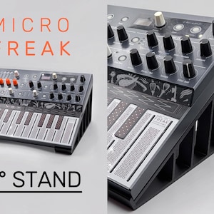 May include: A black synthesizer with a keyboard and numerous knobs and buttons. The text "MICRO FREAK" is in orange above the synthesizer, and "25° STAND" is below. The synthesizer is on a black stand.