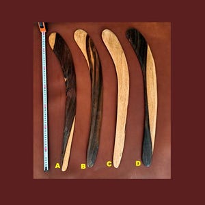 Aboriginal KILLING-STICK in wood, modern craft piece made by Aboriginal people with cover. 4 references Base in OPTION