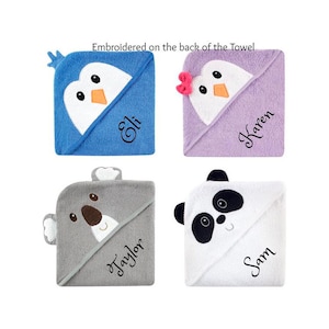May include: Four hooded towels with animal faces and embroidered names. The towels are blue, purple, gray, and white. The names are Eli, Karen, Taylor, and Sam.