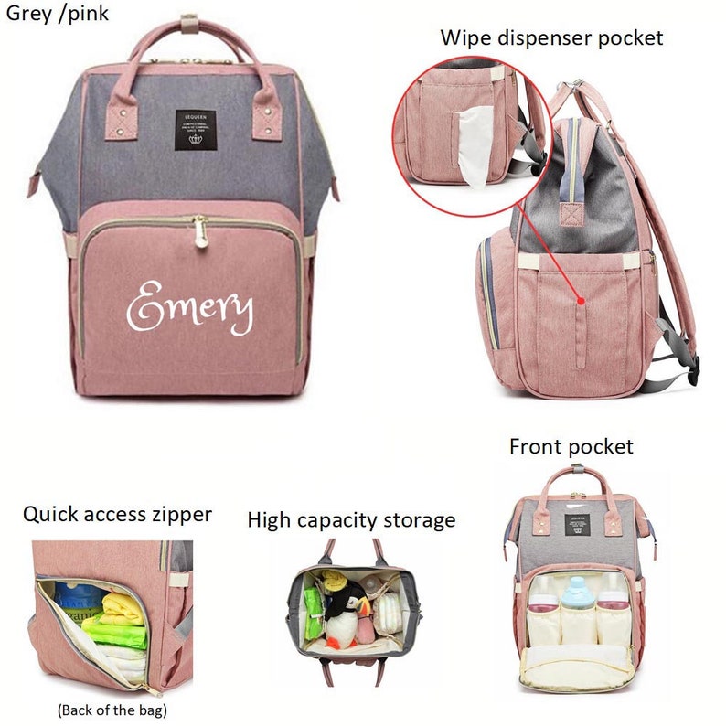 May include: A grey and pink diaper bag with multiple pockets and compartments. The bag has a zippered pocket on the back, a wipe dispenser pocket on the side, and a large front pocket. The bag is also personalized with the name "Emery".