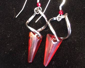 Swirl & Spike red magma swarocski crystal focals with twisted silver fixtures and reiterated swarovski red magma crystal on earwire