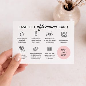 May include: A white card with the text "LASH LIFT aftercare CARD" and aftercare instructions. The card includes icons and text such as "Do not get your lashes wet for 24 hours" and "Avoid sleeping face down."
