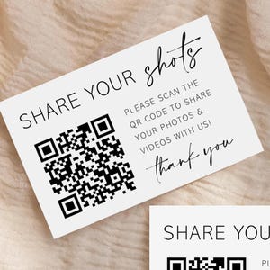 Puede incluir: Una tarjeta rectangular blanca con texto negro que dice SHARE YOUR shots, PLEASE SCAN THE QR CODE TO SHARE YOUR PHOTOS & VIDEOS WITH US! thank you, y un c&oacute;digo QR grande en blanco y negro impreso en el lado izquierdo de la tarjeta.