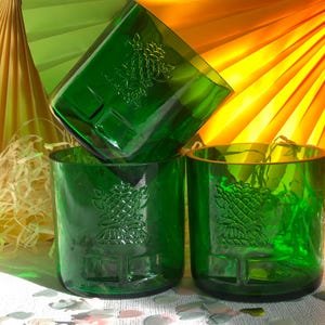 https://www.etsy.com/listing/1856635461/recycled-bottle-of-tanqueray-london-dry?ref=shop_home_active_13&crt=1&logging_key=50874add89ecf9c2fcccfa031450756f9c855dc0%3A1856635461