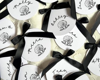 Wedding minimalist name place card shell theme with black bow satin ribbon