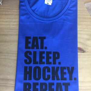Eat sleep hockey repeat - hockey fan tshirt - hockey player tshirt - hockey gift - hockey present