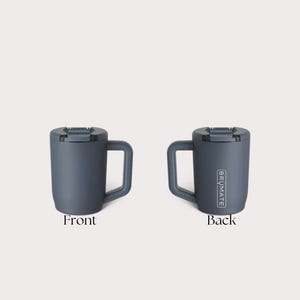 May include: A dark blue travel mug with a lid and a handle. The mug has the word "BR&Uuml;MATE" printed on the side. The mug is shown from the front and back.