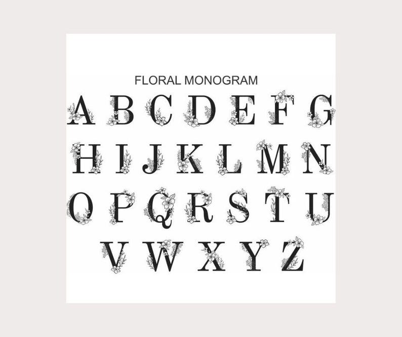May include: A black and white alphabet with floral accents. Each letter is decorated with a small floral design. The letters are arranged in alphabetical order. The text "FLORAL MONOGRAM" is at the top of the image.
