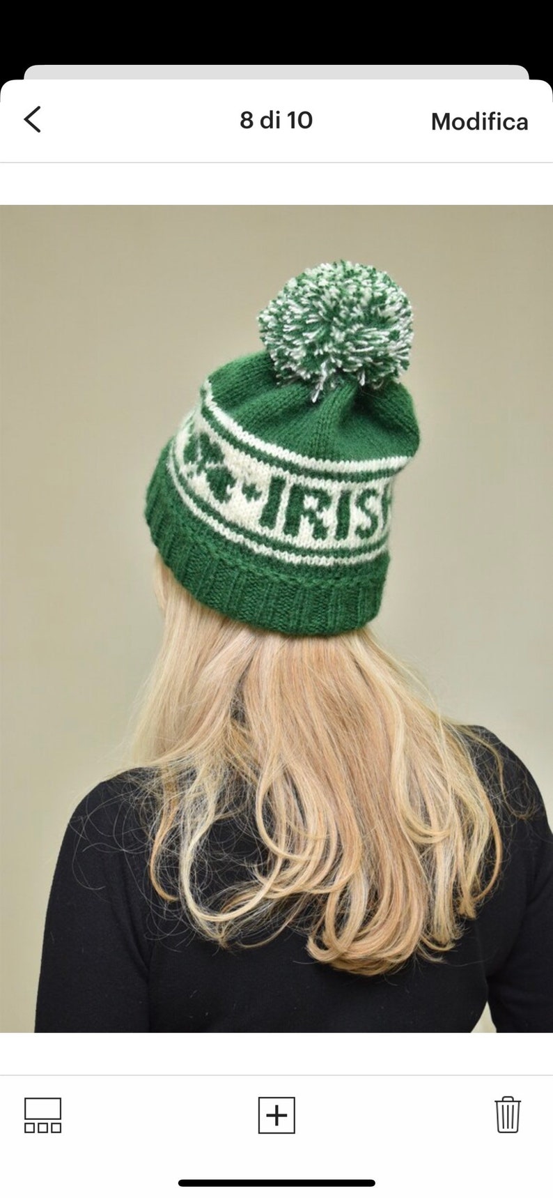 May include: Green and white knitted beanie with a pom pom on top. The beanie has the word "Irish" knitted into the design.