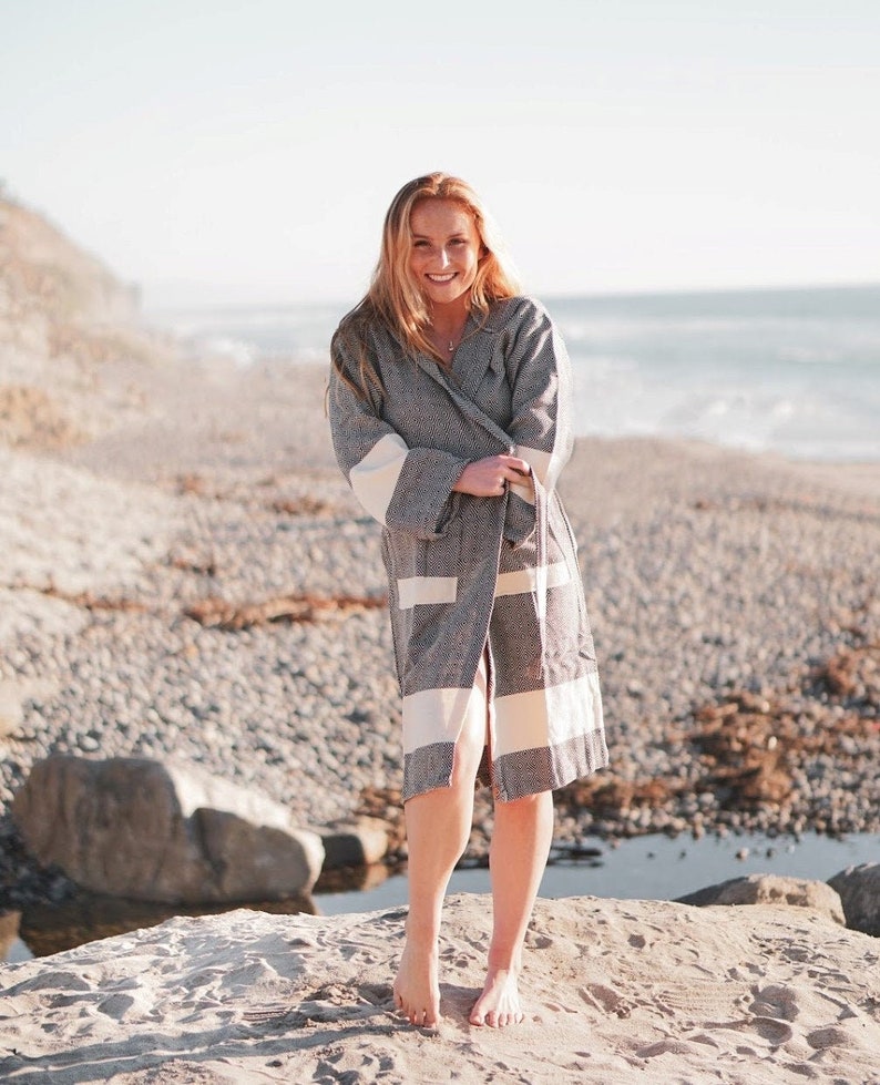 100% Cotton, hand made light weight bathrobe. It has pockets and hood. Comes in black, grey, blue, red, beige, turquoise, dark green and purple.