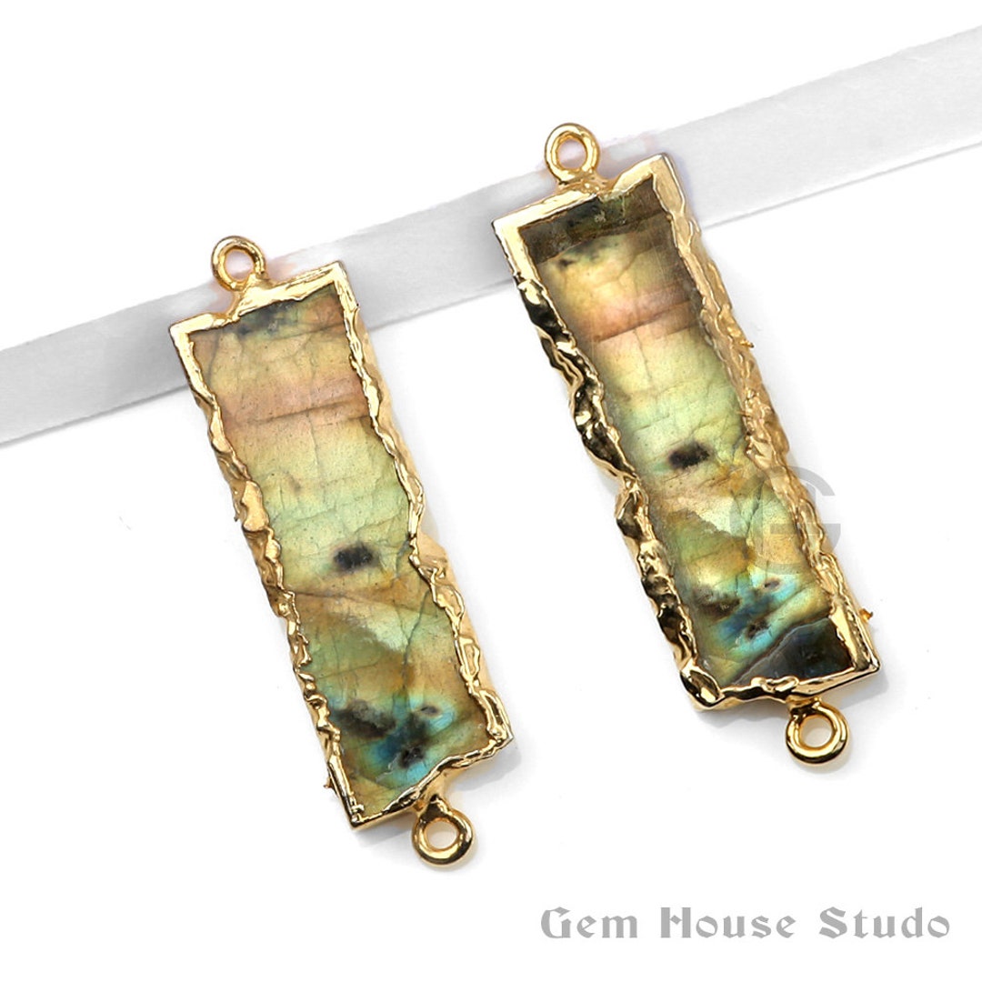 Ciondolo a forma di polpo in labradorite, avvolto in filo di rame Ciondolo a forma di polpo in labradorite, avvolto in filo di rame