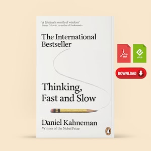 Peut inclure: Une couverture de livre blanche avec le titre "Thinking, Fast and Slow" de Daniel Kahneman, lauréat du prix Nobel. La couverture comprend également le texte "The International Bestseller" et une citation de Steven D. Levitt, co-auteur de Freakonomics.