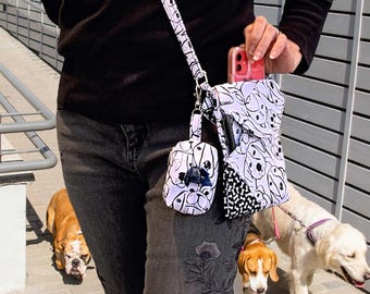 Bolso de paseo para perros de cinco bolsillos con bolsa para excrementos.