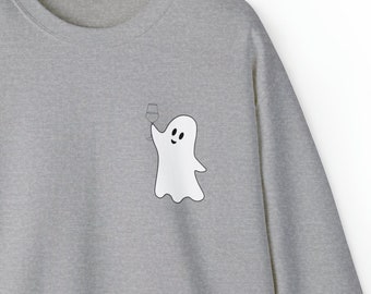 May include: A gray sweatshirt with a white ghost holding a glass of wine printed on the front.