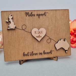 Miles apart, but close in heart wooden postcard