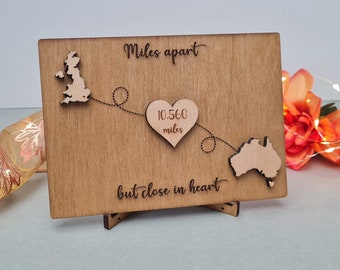 Miles apart, but close in heart wooden postcard