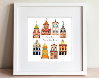 May include: A colorful illustration of the Country Club Plaza in Kansas City, Missouri. The illustration features several buildings with unique architectural details, including towers, domes, and clock faces.