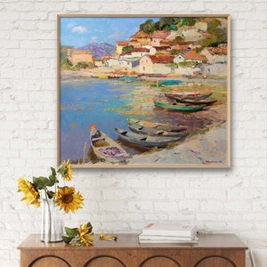 May include: A painting of a small village on a hillside with boats in the water. The sky is blue and the water is a light blue. The boats are various shades of green and brown. The village is painted in shades of yellow, orange, and red.