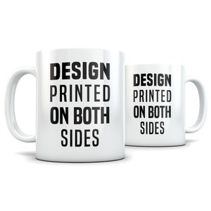 May include: White ceramic mug with black text that reads "DESIGN PRINTED ON BOTH SIDES". The mug is shown from the side and the text is visible on both sides of the mug.