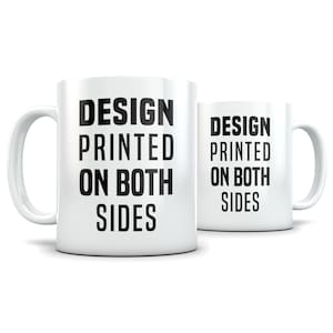 May include: White ceramic mug with black text that reads "DESIGN PRINTED ON BOTH SIDES". The mug is shown from the side and the text is visible on both sides of the mug.