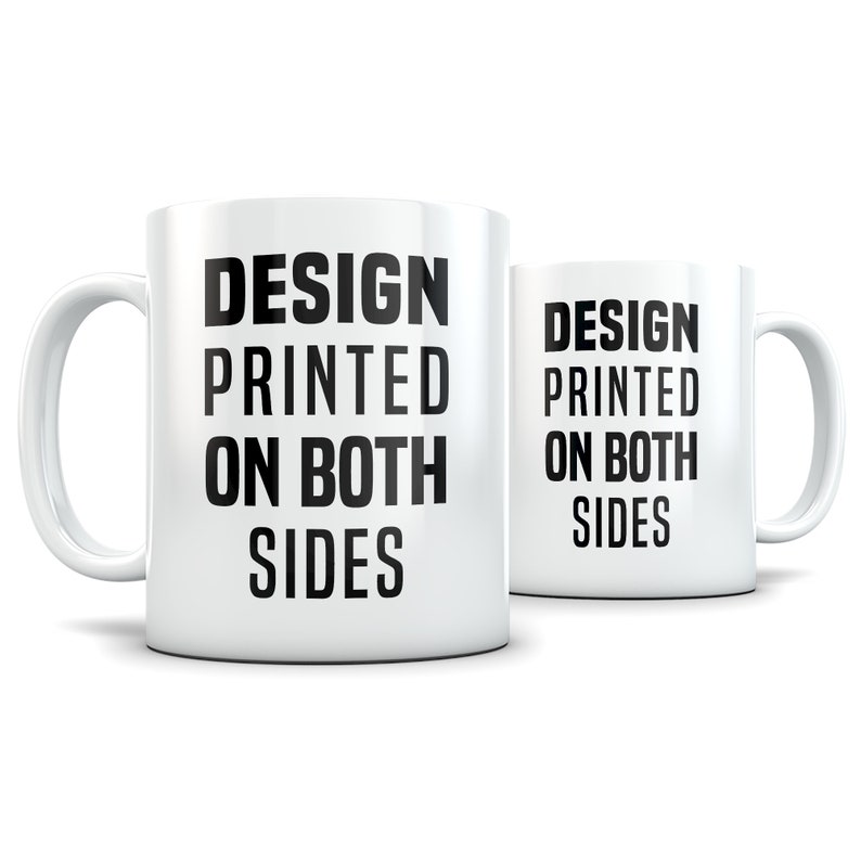 May include: White ceramic mug with black text that reads "DESIGN PRINTED ON BOTH SIDES". The mug is shown from the side and the text is visible on both sides of the mug.