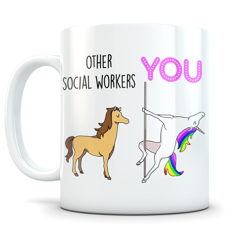 May include: White ceramic mug with the text "OTHER SOCIAL WORKERS YOU". The mug features cartoon illustrations of a horse and a unicorn, with the unicorn posed on a pole. The unicorn has a rainbow mane and tail.