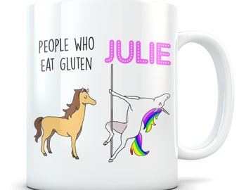 May include: White ceramic mug with a pink unicorn and a brown horse illustration. The text "People who eat gluten" is on the left side of the mug and "Julie" is on the right side.