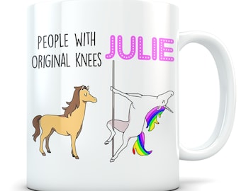 May include: White ceramic mug with the text "PEOPLE WITH ORIGINAL KNEES" and the name "JULIE" in pink. The mug features cartoon illustrations of a horse and a unicorn pole dancing with a rainbow mane.