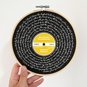 Personalised Favourite Song Lyrics Vinyl Record Cotton Print In Circular Frame | Printed And Framed Within An Embroidery Hoop