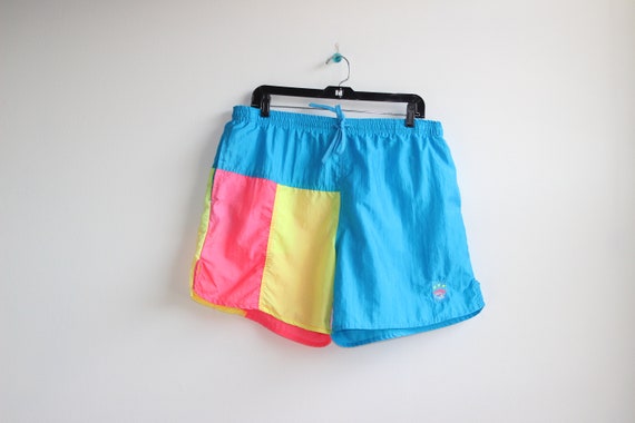 UMBRO PELE SHORTS \ pele spell out soccer shorts | 90s umbro shorts | vintage umbro | men's size large | neon umbro shorts | neon soccer | UMBRO PELE SHORTS \ pele spell out soccer shorts | 90s umbro shorts | vintage umbro | men's size large | neon umbro shorts | neon soccer |
