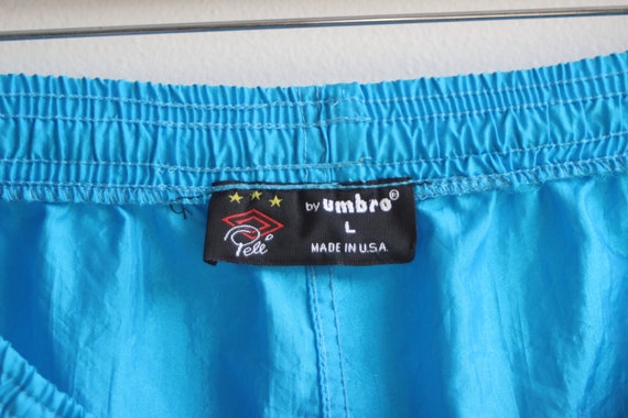 UMBRO PELE SHORTS \ pele spell out soccer shorts | 90s umbro shorts | vintage umbro | men's size large | neon umbro shorts | neon soccer | UMBRO PELE SHORTS \ pele spell out soccer shorts | 90s umbro shorts | vintage umbro | men's size large | neon umbro shorts | neon soccer |