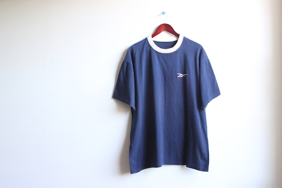 blue reebok shirt