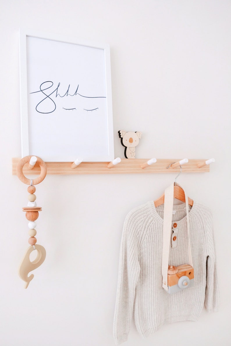 wooden coat peg rail