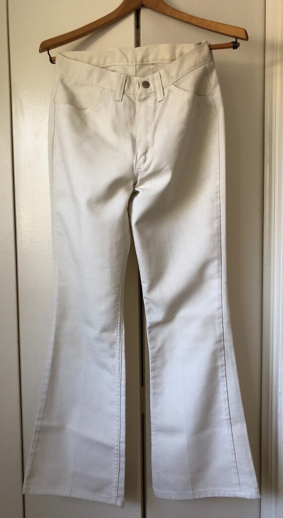 bell bottom wrangler jeans