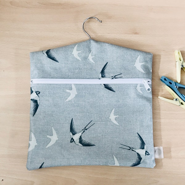 Wipeable Peg bag with zip closure and hanger  - swallows pattern
