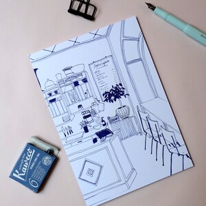 May include: A black and white line drawing of a cafe interior. The drawing features a counter, shelves, chairs, and a menu board with the text "Appetiser Sp&eacute;ciale".