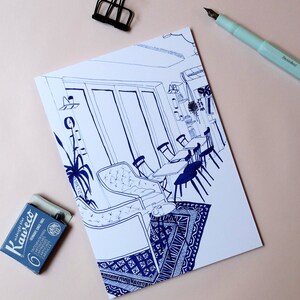 May include: A black and white line drawing of a cafe interior with tables and chairs. The drawing is on a white background and includes a large window with a view of the outside.