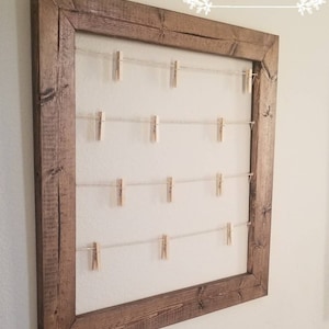Rustic Clothespin Photo display. Baby shower display. Wedding photo display. Clothesline frame. 23&quot;x 23&quot; Collage frame.  gift decor poloroid