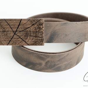 leather belt with walnut tree trunk design