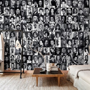 Modern living room decorated with a black and white photo collage mural featuring famous Black icons, creating a striking monochrome accent wall.