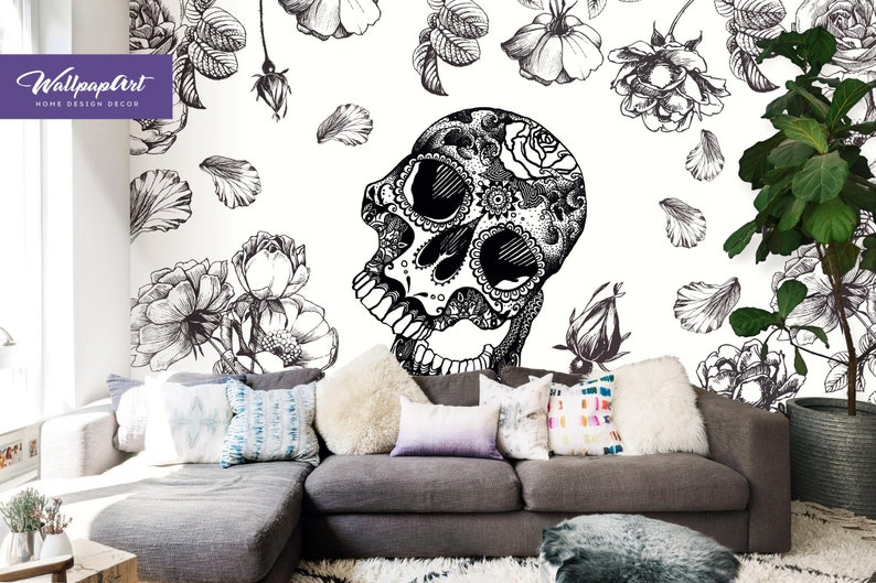 May include: Black and white illustration of a skull with floral details, surrounded by roses and petals on a white background. The image is part of a wall mural.